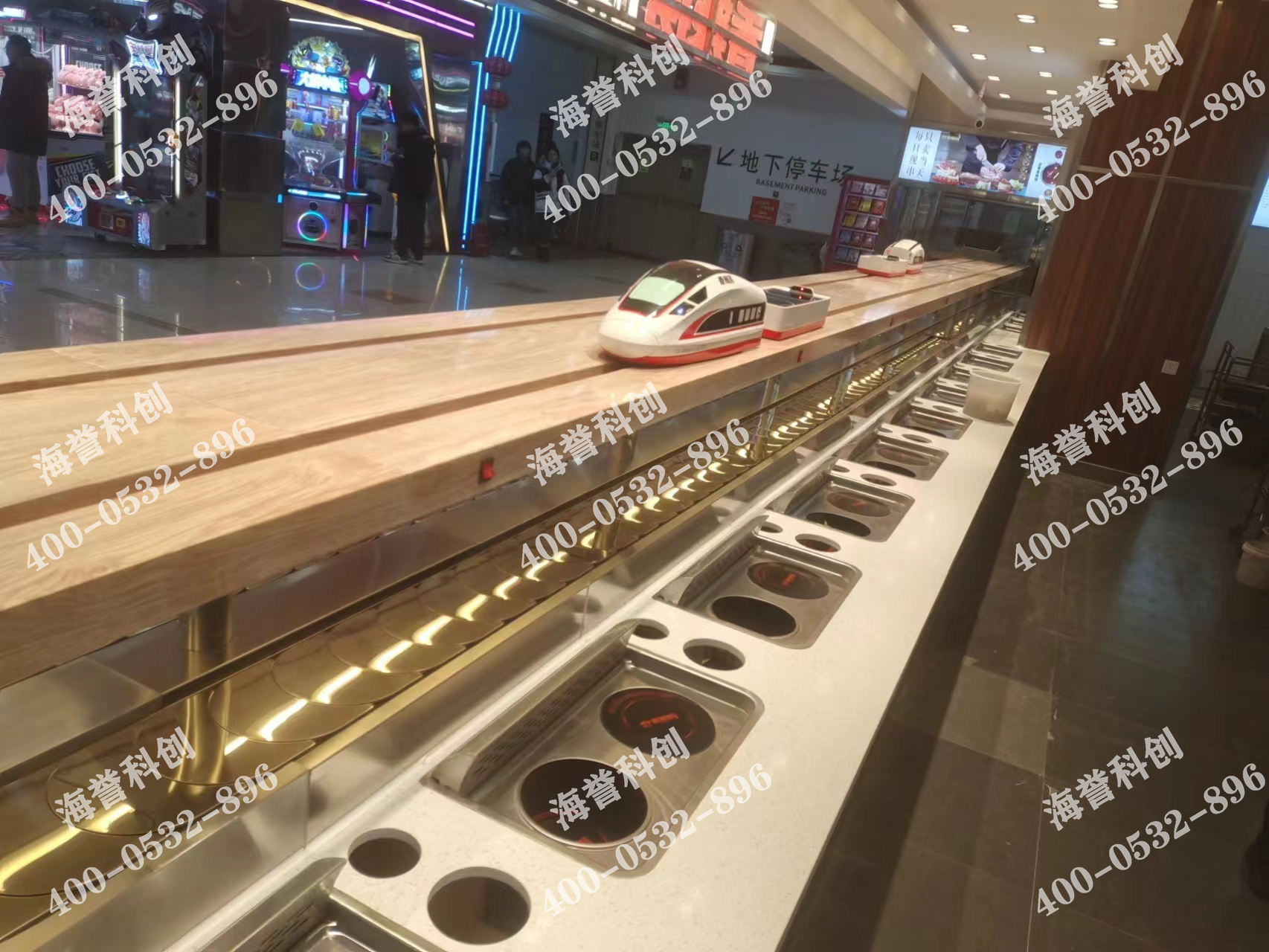 海譽科創(chuàng)內(nèi)蒙古通遼涮烤一體小火鍋搭載智能送餐小火車安裝完成